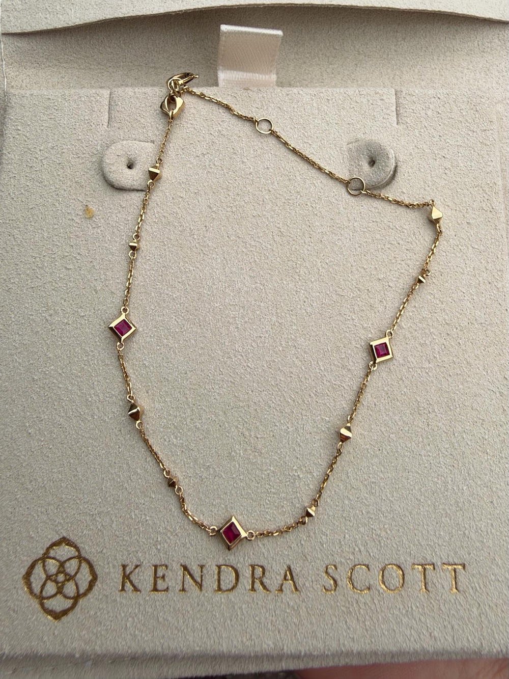 Kendra Scott 14k gold and ruby Michelle bracelet